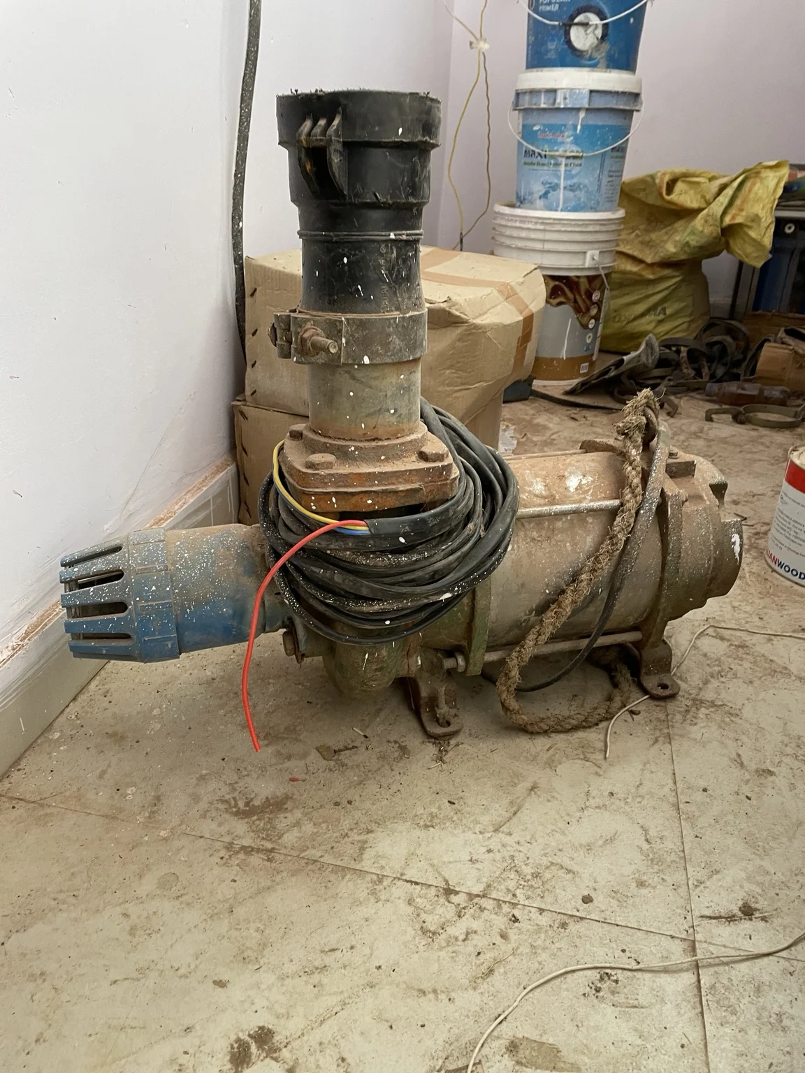 An electric motor and water-pump assembly from the farm archive.